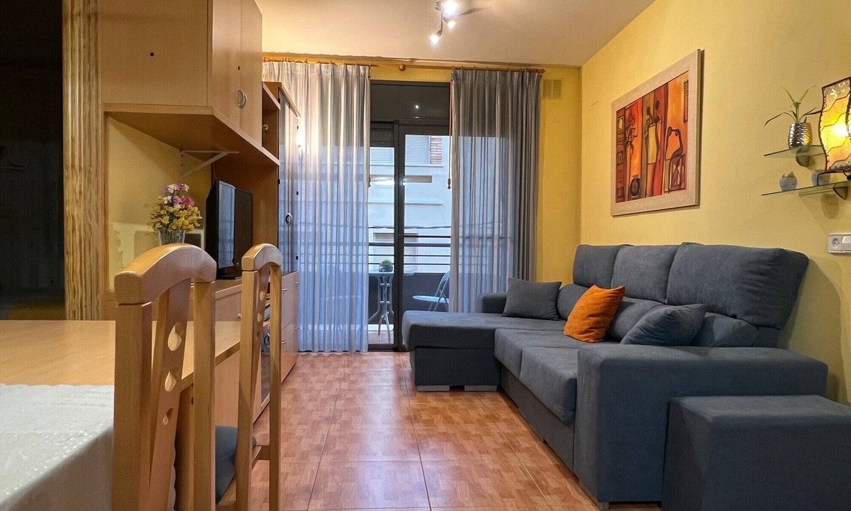 Sant Carles de la Rapita Apartment | Apartment 'Edificio Simancas' Balcony and Air Conditioning