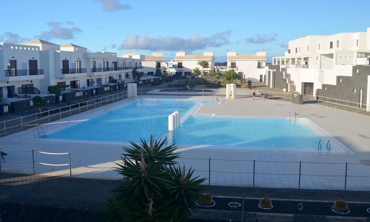 Costa Teguise Apartment | Charming duplex apartment in a luxury complex. at. pool repair 01/2023