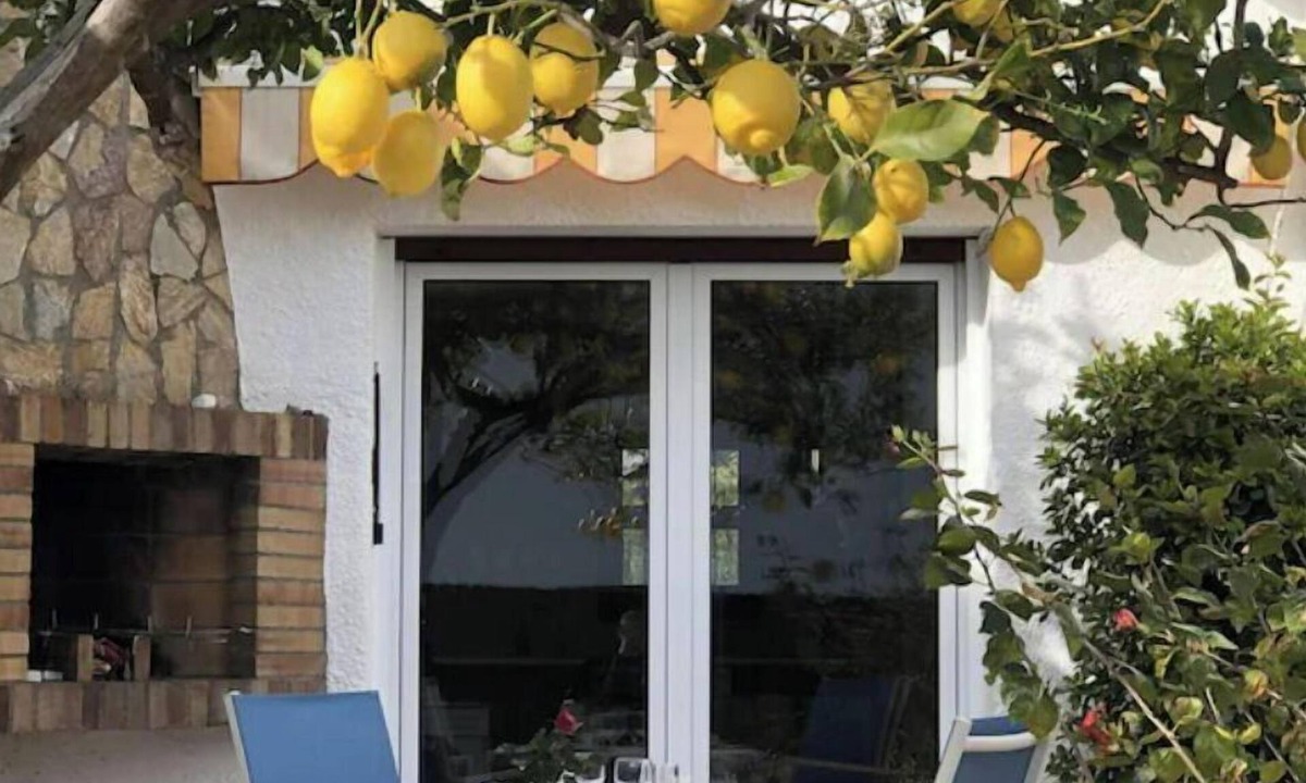 Llanca House | Charming, renovated house—4-minute walk to Grifeu Beach—Beautiful garden—Parking—Air conditioning