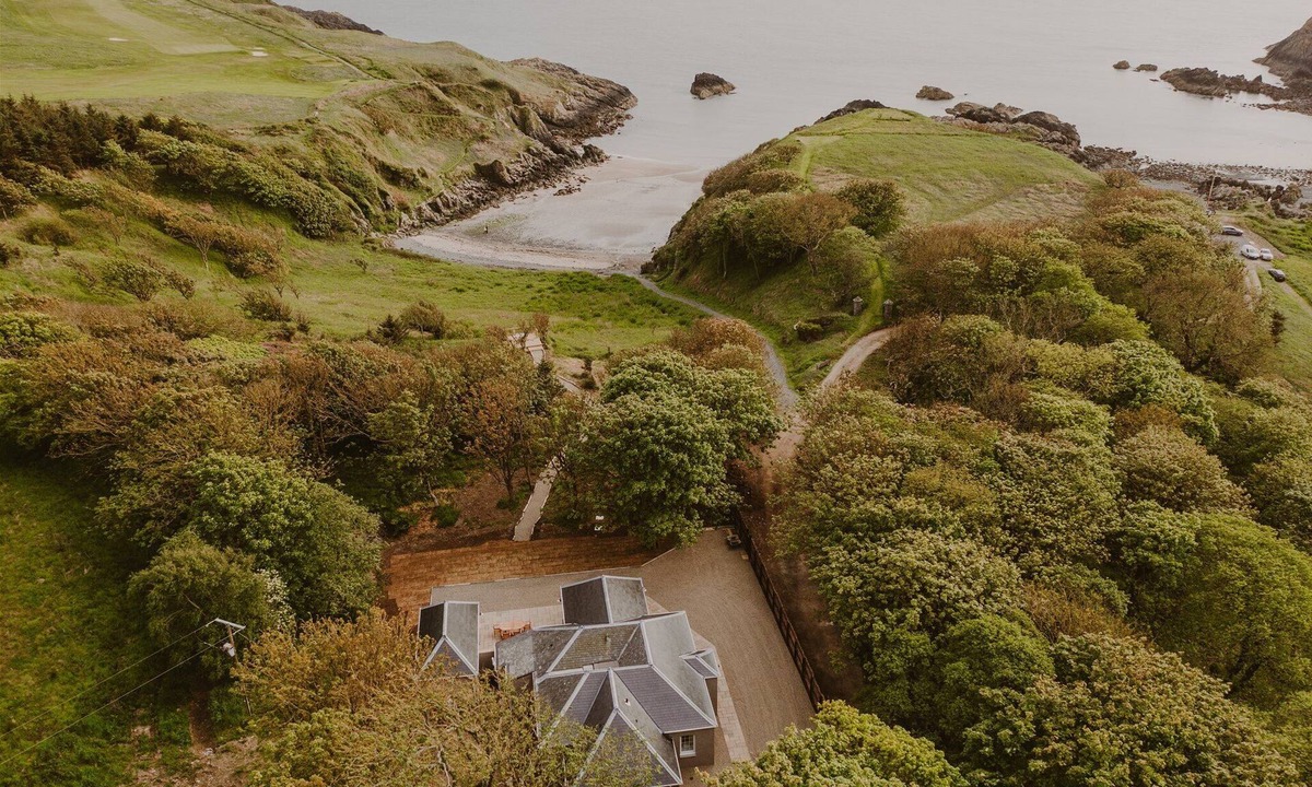 Portpatrick Cottage | Coastal Magnificence: Saltwater Chronicles with private sea view deck.