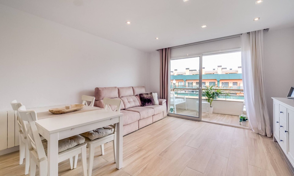 Palafolls Apartment | Cozy duplex for 4 people, free wifi and air conditioning next to the bedrooms. Vivalidays Elisabet community pool and garden