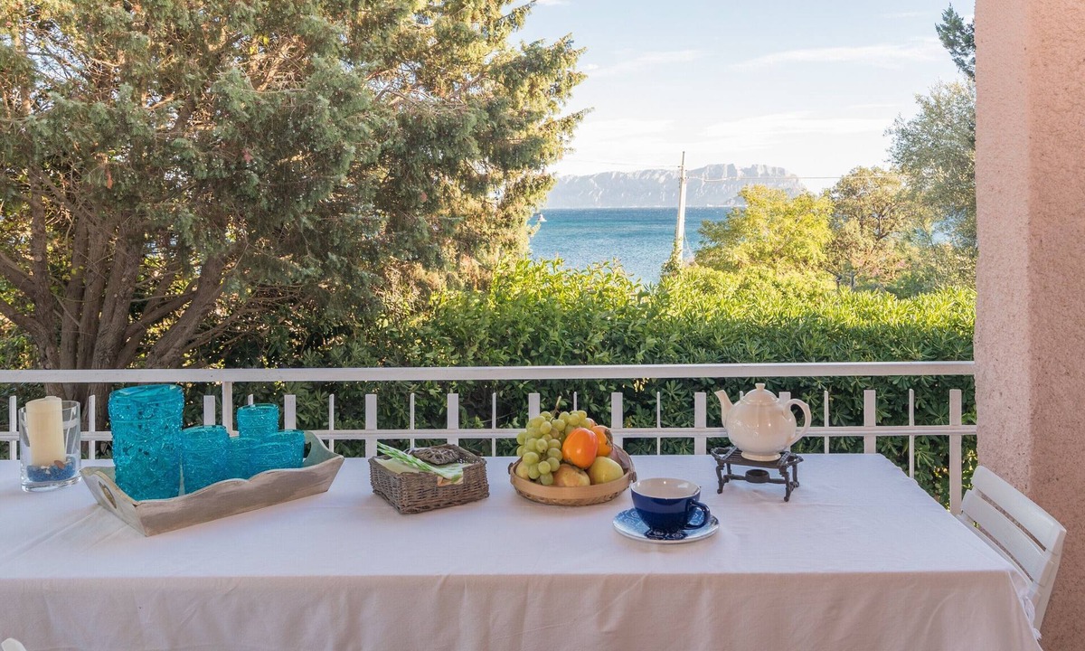 Pittulongu House | Holiday Home "Villa Rosa sul Mare" with Sea View, Terraces and Wi-Fi