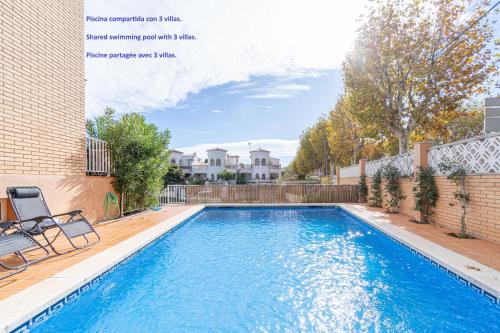 Empuriabrava Ski Chalet | Jouvacations Villa 3 Freser con piscina compartida