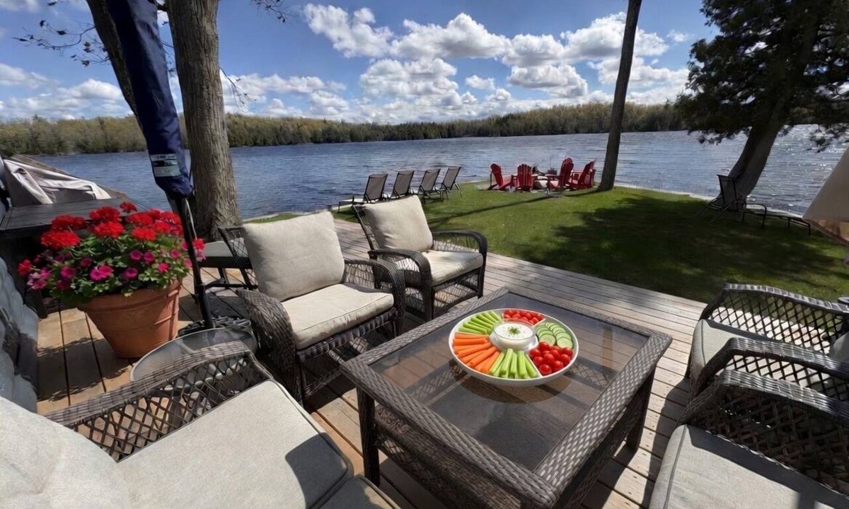 Trent Lakes Cottage | Private Waterfront Point |Surrounded by Water, Fire Pit & Kayaks Included