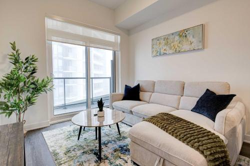 Kitchener House | Stylish Downtown Suite with Patio & City Views