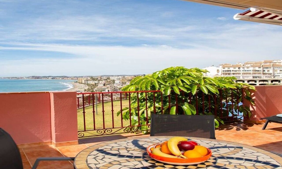 La Capellania Apartment | This seaside apartment is perfect for relaxation with its terrace offering sea views and soothing wave sounds. It features two bedrooms, two fully equipped bathrooms, a spacious living room, and a kitchen. Enjoy meals or sunbathe on the loungers