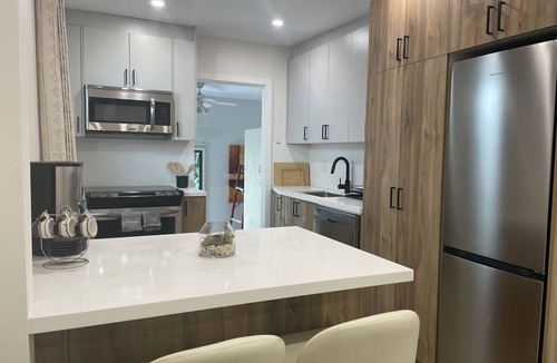 Woodbine Heights House | 1BR Main Floor Toronto | 15 Min Downtown + Parking