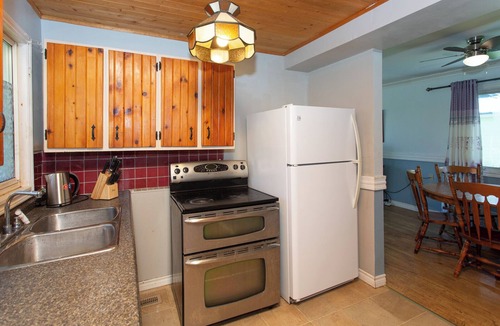 Lindsay House | 2-Bedroom Cottage Steps from Sandy Beach for fishing, boating, and Firepits