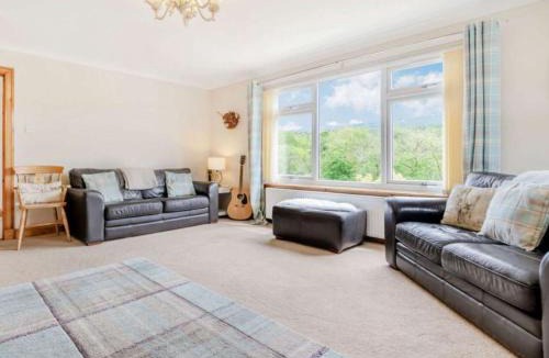 Killin Villa | 3 Bedroom luxury home, hot tub, stunning views of Killin, sitting on the River Dochart