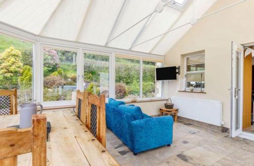 Killin Villa | 3 Bedroom luxury home, hot tub, stunning views of Killin, sitting on the River Dochart