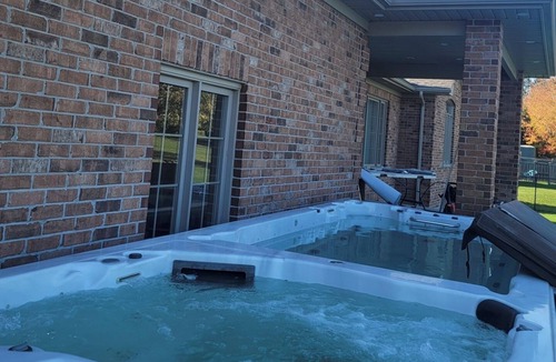 Township of Wellesley House | 5-bedroom bungalow with pool, Hot tub, fire pit, play ground, in CrossHill On