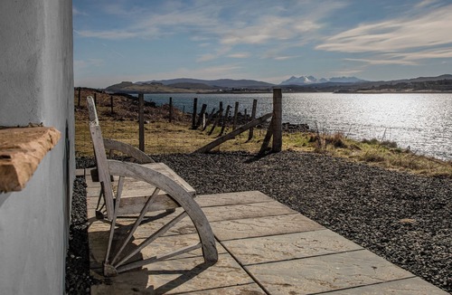 Kingsburgh Cottage | A secluded Skye boathouse where rugged beauty meets refined coastal living.