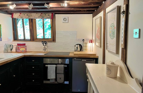 Chevington Cottage | A unique Suffolk timber-framed cottage set within private lawns and woodland.