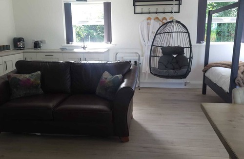 Enniskillen Cabin | Adorable 1-bedroom cabin in charming Enniskillen awaits you. With private hottub