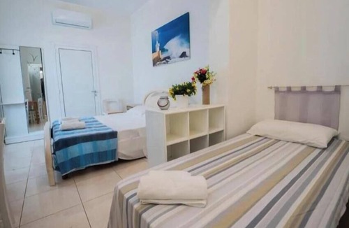 Uggiano la Chiesa Bed & Breakfast | Anemone Studios - Triple room with private bathroom in Salento