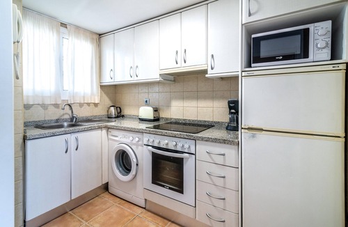 Marbella Seafront Promenade Apartment | Apartment 'Edificio Caesar Imperator' with Sea View, Pool, Wi-Fi & Garden
