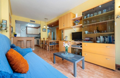 Sant Carles de la Rapita Apartment | Apartment 'Edificio Simancas' Balcony and Air Conditioning