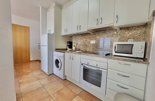 Almadraba-Canyelles Apartment | Apartment in Roses with pool, WiFi, air conditioning, and parking, close to beach