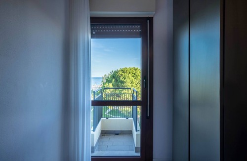 Lignano Sabbiadoro Apartment | Apartment "La Terrazza Sul Faro" with Sea View, Balcony and Wi-Fi