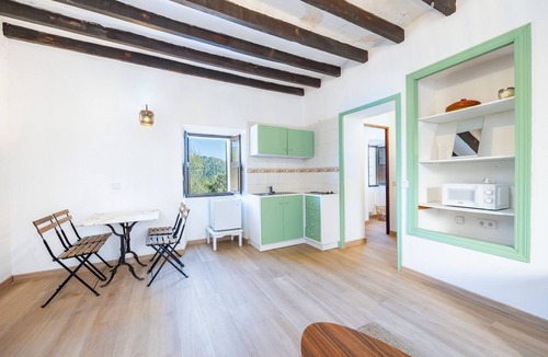 Puigpunyent House | Apartment with Mountain Views, Shared Pool, and Wi-Fi