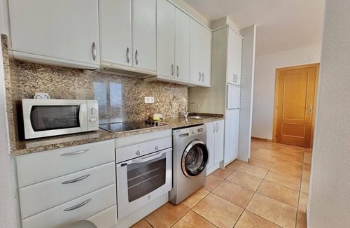 Almadraba-Canyelles Apartment | Apartment with pool, AC, and parking 700m from the beach in Roses