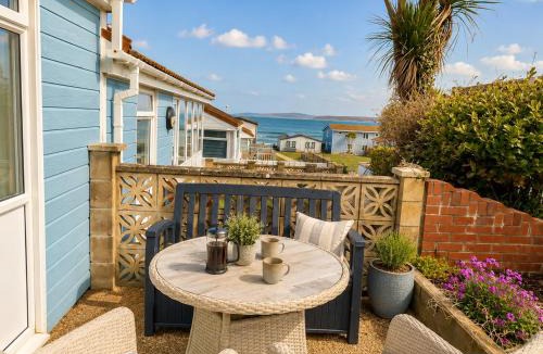 Westleigh Ski Chalet | Beach Cottage 43, A stone's throw from the sea