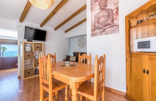 Benajarafe Apartment | Beachfront Apartment with Air Conditioning, Stunning Views, Terrace, and Wi-Fi