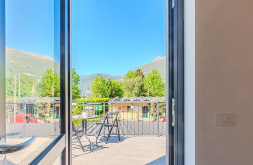 Dervio Apartment | Beautiful apartment for 4 guests with pool, WIFI, A/C, TV, patio and panoramic view