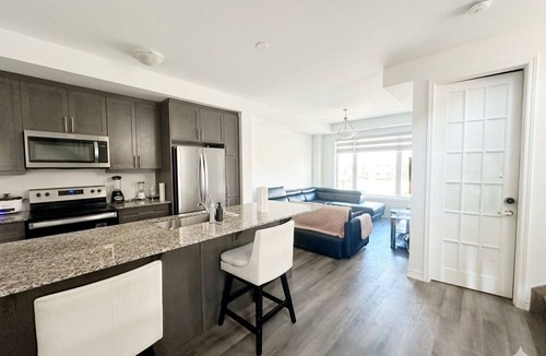 Brampton House | Bedroom (Queen bed) within shared space