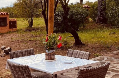 San Teodoro Apartment | Bilo Nuragheddu: delightful one-bedroom apartment surrounded by greenery