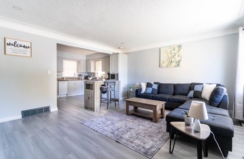 Windsor House | Bright 2 beds, 1 bath home with large yard and close to Airport and Shopping