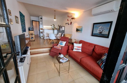 Pedrinya Apartment | Bright apartment with communal pool, 50m from the beach