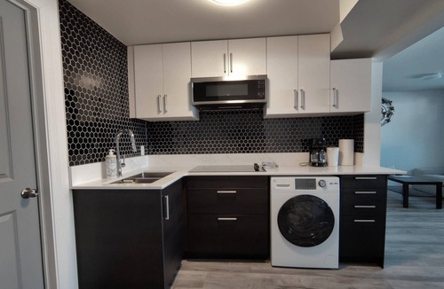 Kitchener Apartment | Bright One Bedroom Apartment w/ Sunroom, Wifi, Parking
