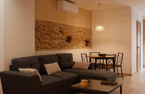 Ordis Apartment | Can Joan Loft - A romantic loft with a medieval arch on the Costa Brava