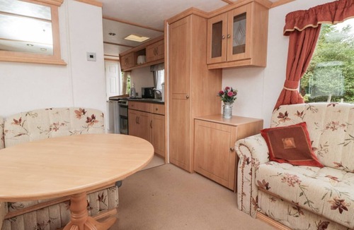 Denny Cabin | Charming Holly Home in Denny