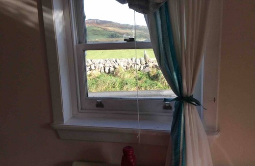 Port Ellen Cottage | Charming quirky coastal Cottage Port Ellen