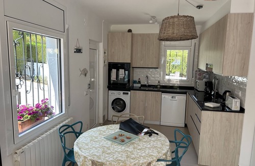 Llanca House | Charming, renovated house—4-minute walk to Grifeu Beach—Beautiful garden—Parking—Air conditioning
