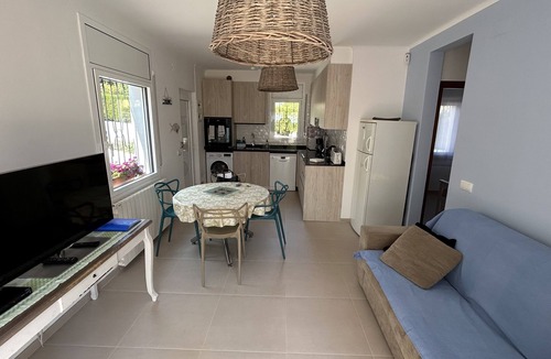 Llanca House | Charming, renovated house—4-minute walk to Grifeu Beach—Beautiful garden—Parking—Air conditioning
