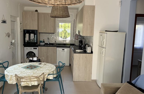 Llanca House | Charming, renovated house—4-minute walk to Grifeu Beach—Beautiful garden—Parking—Air conditioning
