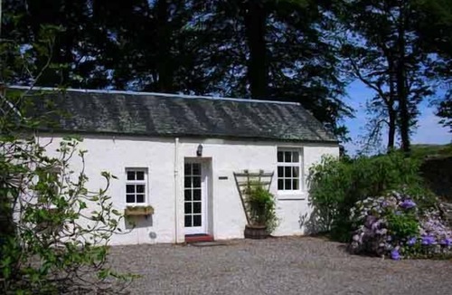 Taynuilt Cottage | Clematis is a spacious, 2-person cottage with lovely outside sitting area.