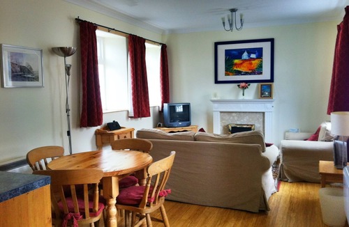 Taynuilt Cottage | Clematis is a spacious, 2-person cottage with lovely outside sitting area.