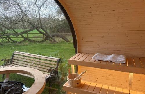 Toppesfield House | Copper Beech Lodge with Hot Tub, Games Room, Fire Pit