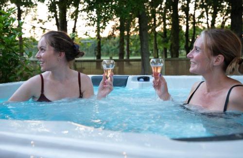 Toppesfield House | Copper Beech Lodge with Hot Tub, Games Room, Fire Pit