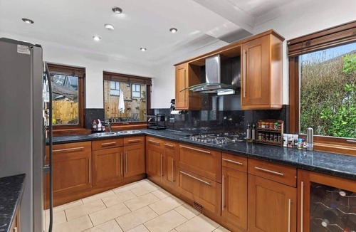 Bearsden House | Corner View - Welcoming family home with hottub.