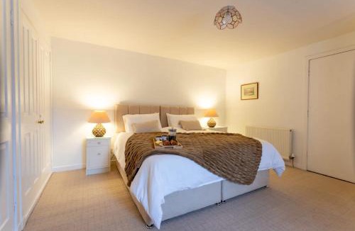 Kirk Yetholm House | Cosy 4-Bed Cottage in Kirk Yetholm by MCPI Hosting, Perfect for Families & Holidaymakers