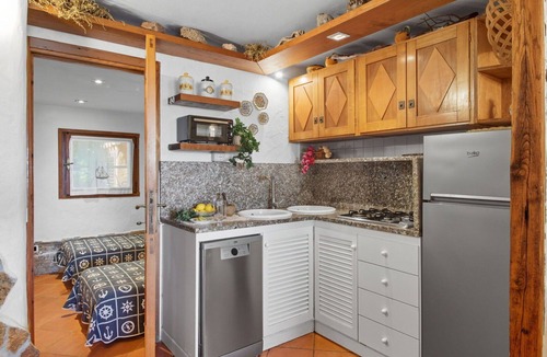 Villaggio Piras Apartment | Cosy apartment for 6 guests with A/C, pool, WIFI, TV and patio