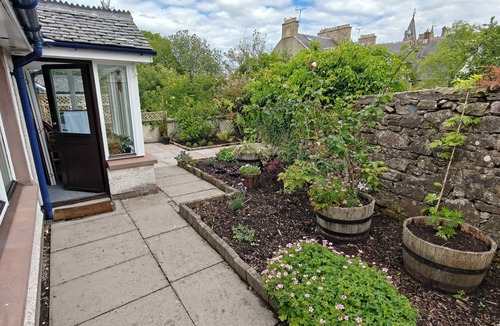 Glenmorangie House | Cosy cottage just off the NC500! Found in a quiet street with a private garden