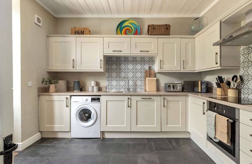 Milford Haven Cottage | Courtyard Cottage with Private Patio & Hot Tub