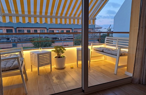 Palafolls Apartment | Cozy duplex for 4 people, free wifi and air conditioning next to the bedrooms. Vivalidays Elisabet community pool and garden