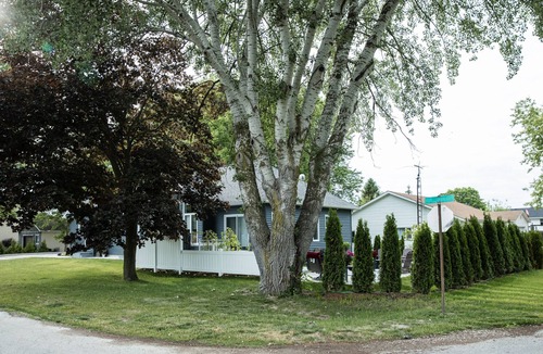 Town of Essex House | Elegant Three Bedroom Home with lake view and a hot tub